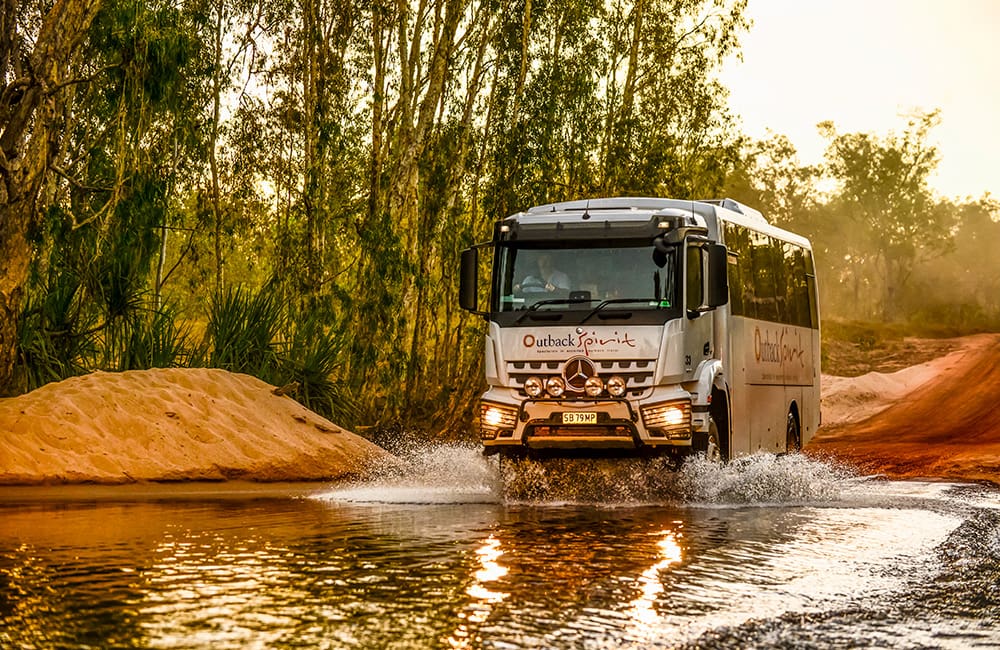 Outback Spirit coach crossing the Drysdale River in the Kimberley. Image: Outback Spirit