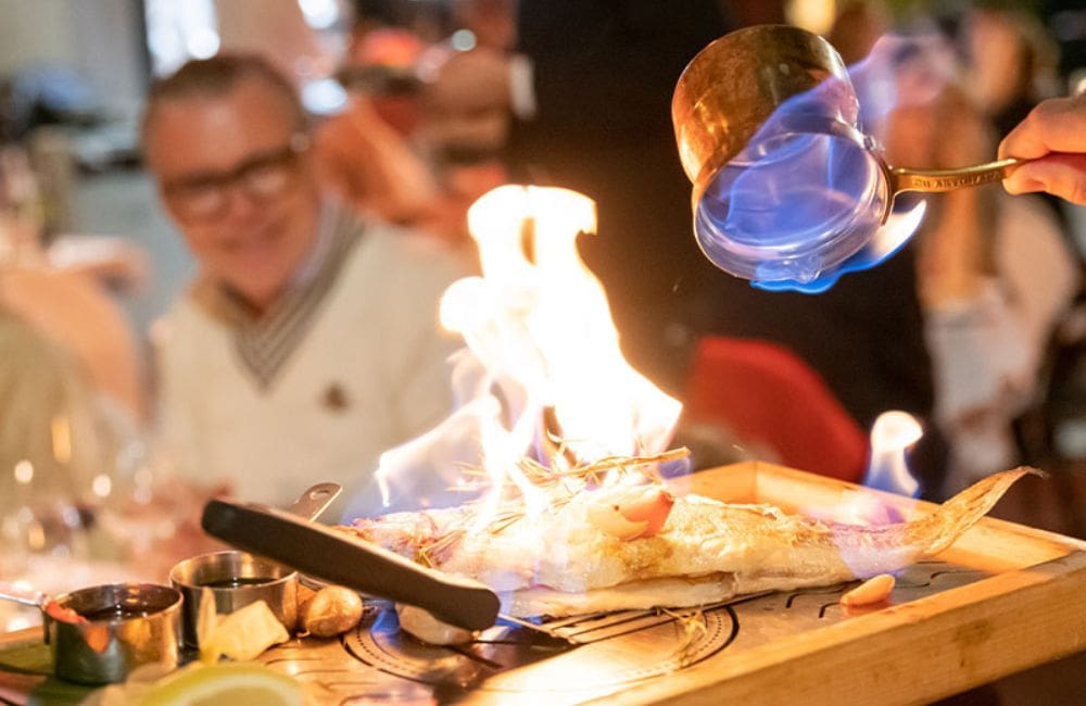Dishes are often prepared in front of guests