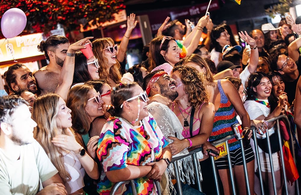 Crowd of onlookers at the 2024 Sydney Gay & Lesbian Mardi Gras Parade. Image: Jordan Munns