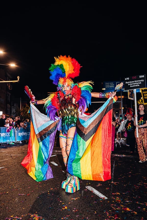 Man in rainbow costume at the 2024 Sydney Gay & Lesbian Mardi Gras Parade. Image: Jordan Munns