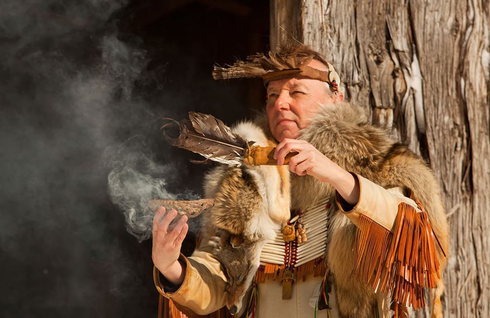 Man performing Indigenous immersive experiences. Image: Indigenous Tourism Canada