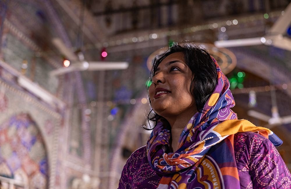 Intrepid Pakistan tour leader Aneeqa Ali in market. Image: Intrepid Travel
