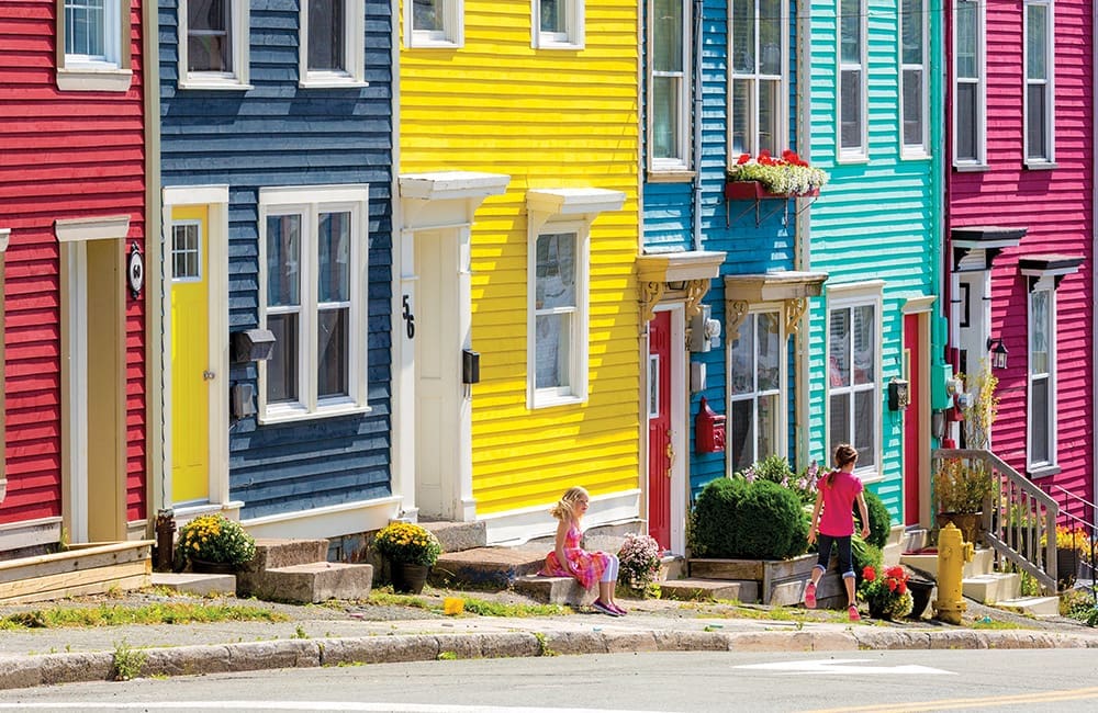 Candy-coloured houses of ‘Jellybean Row’ in St John’s, Newfoundland and Labrador. Image: Barrett & MacKay Photo