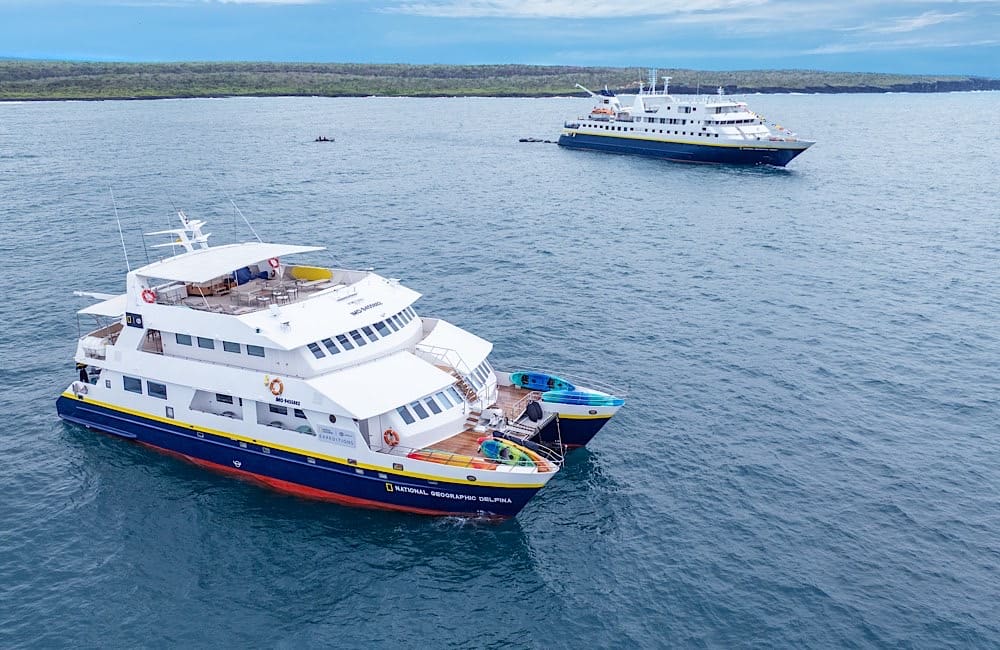 National Geographic Delfina and National Geographic Gemini in the heart of the Galápagos archipelago—Academy Bay.