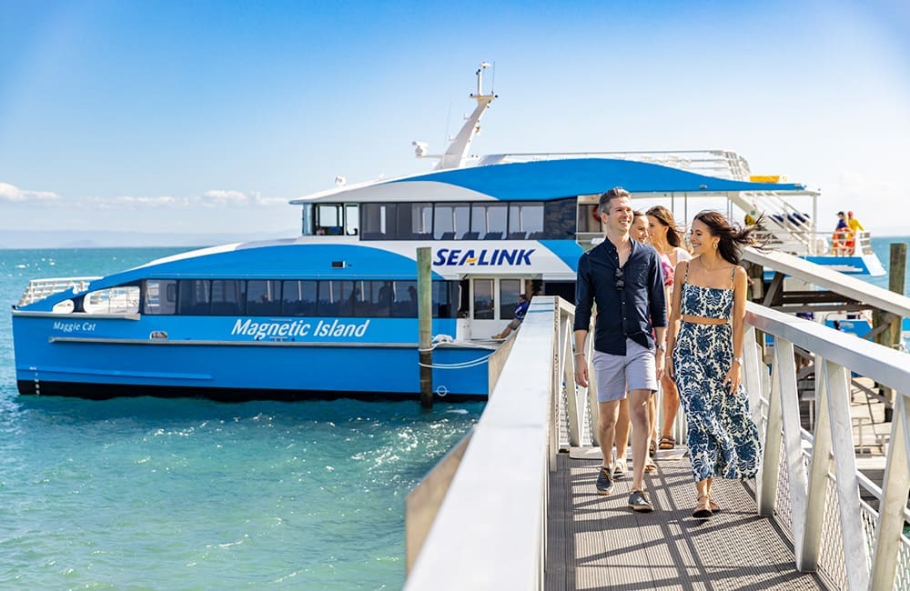 Tourist leaving Sealink Magnetic Island Ferry. Image: Tourism and Events Queensland