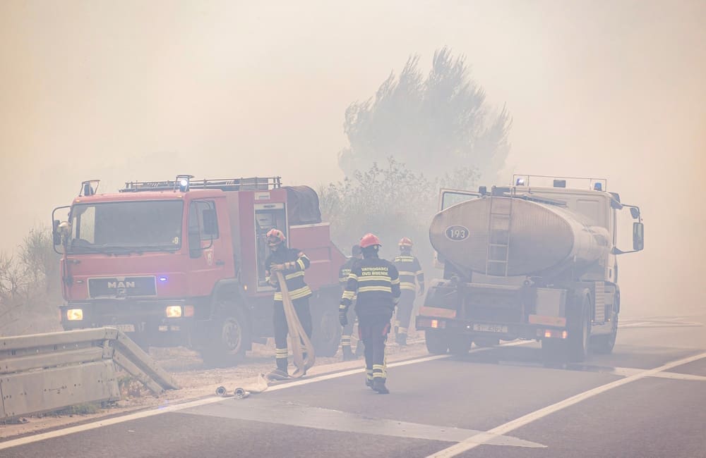 Firefighters battle a wildfire in Dalmatia near Šibenik, Croatia in 2025 amid record-breaking heatwaves. Image: fotoreporter_112/Shutterstock