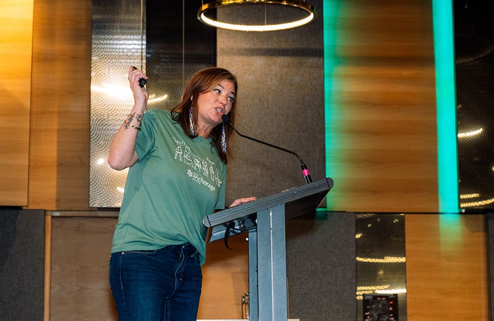 Visit Anchorage's Tia Froehle on stage at Niche is Nice 2025.
