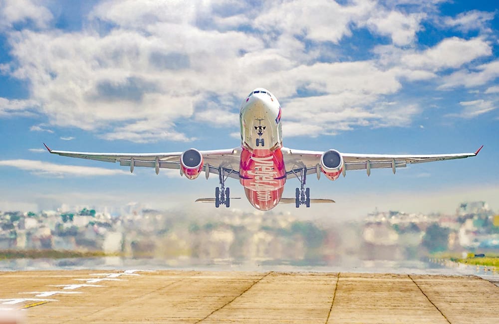 Vietjet aircraft takes off from airport with underbelly showing