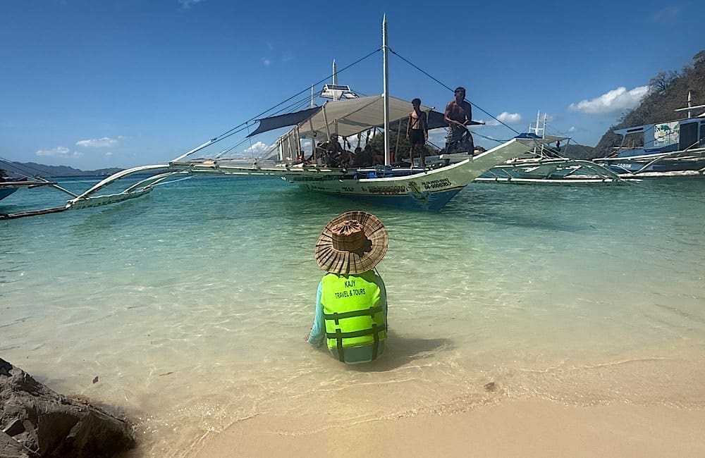 Another day, another perfect beach. With the hotel’s help, we booked a spur-of-the-moment island adventure. The only real decision? Where to swim first. Coron