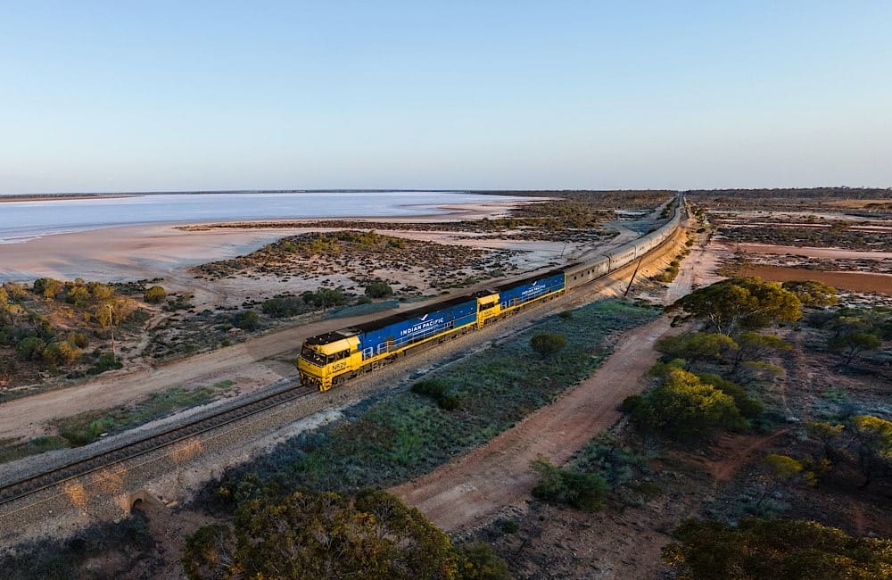 The Indian Pacific passing Lake Julia – another iconic Journey Beyond rail experience.