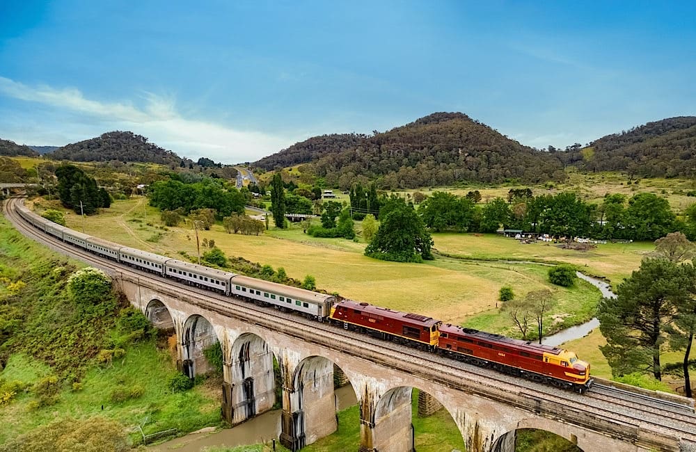 The train winds through classic NSW countryside, turning the journey into part of the Elvis experience.