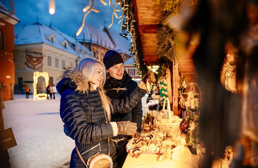 Couple at Christmas Markets in Brasov, Romania. Image: AmaWaterways