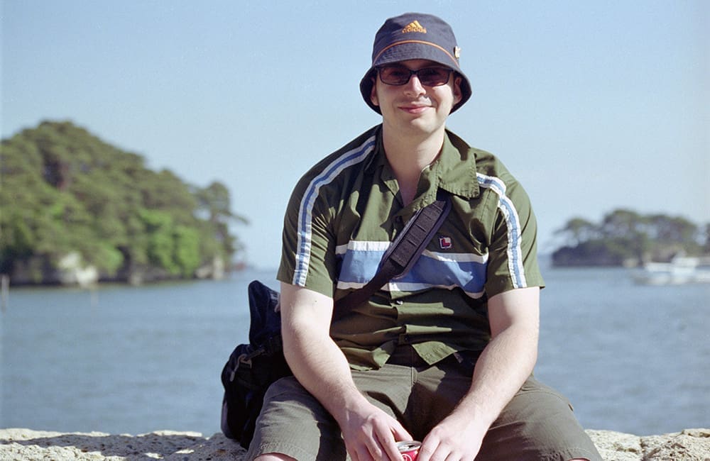 Inside Travel Group Co-Founder Alastair Donnelly in Matsushima Bay, Japan for the 2002 FIFA World Cup.