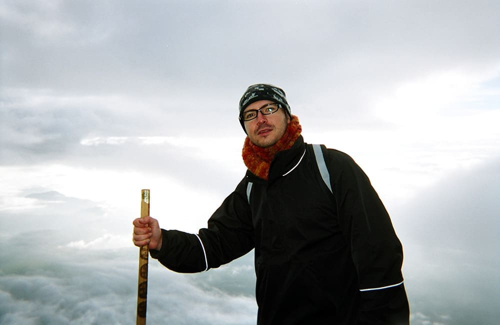 Inside Travel Group Co-Founder Alastair Donnelly at the summit of Mt Fuji for sunrise views in 2005.