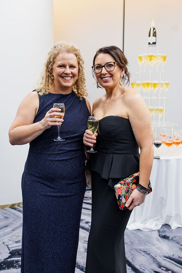 Two women in formal dresses at Karryon Glam Club 2025 NTIA pre-event.
