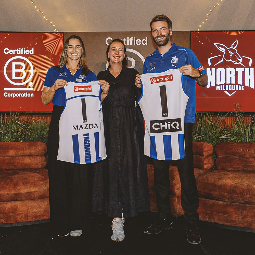 NMFC AFLW Midfielder Eilish Sheerin & NMFC AFL Medium Defender Luke McDonald with Intrepid Travel ANZ GM Yvette Thompson (centre) at the NFMC B Corp announcement.