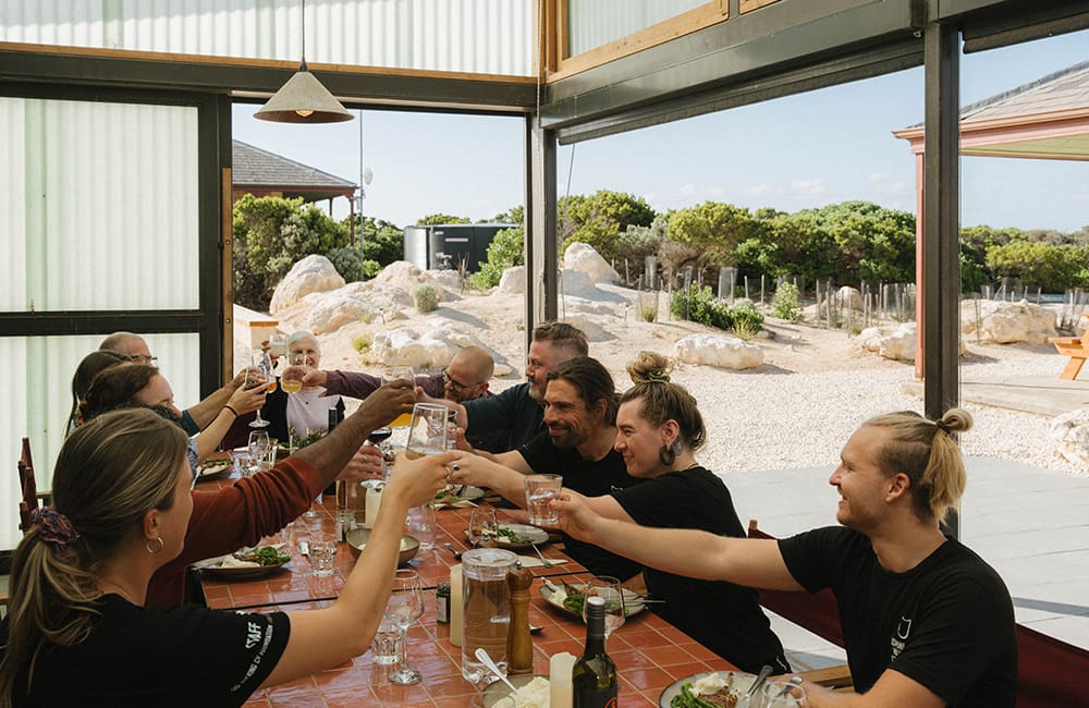 Great Walks of Australia – Group dinner at Cape du Couedic Lighthouse cottages on the Kangaroo Island Signature Walk. Image: Declan Hartley-Brown