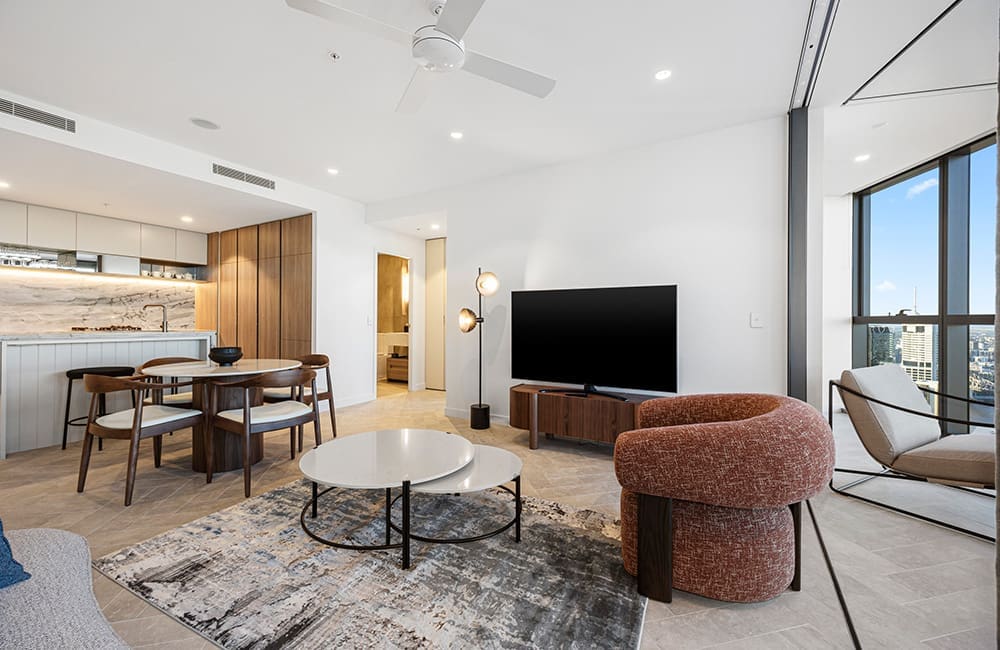 Two-Bedroom Premium Skyline View suite living area at Avani Living Queen’s Wharf Residences.