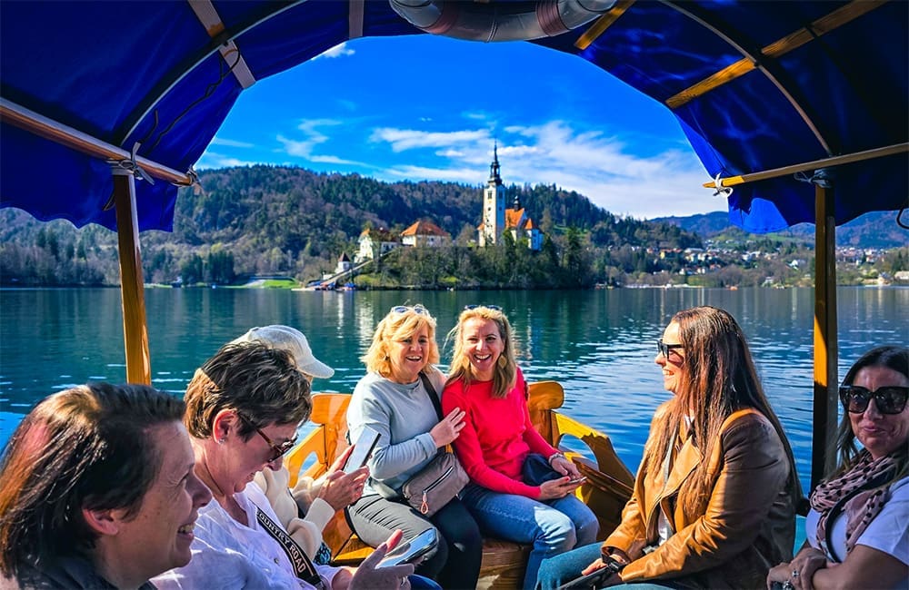  Bunnik Tours Jewels of Dalmatia group on Lake Bled, Slovenia. Image: Dennis Bunnik – Black Friday 2025