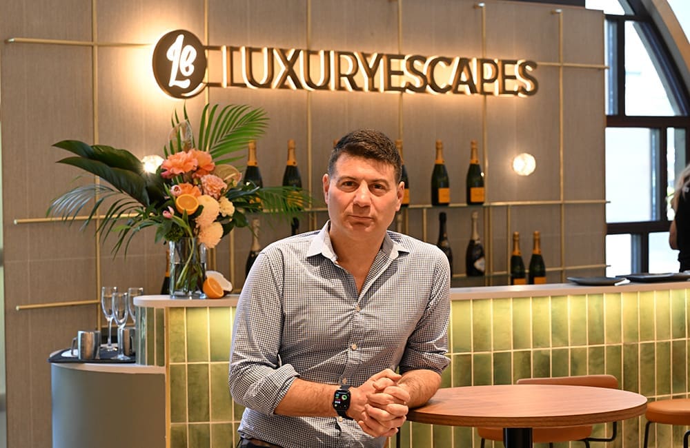 Luxury Escapes Co-Founder & CEO Adam Schwab at the boutique bar at the Bondi Junction store.
