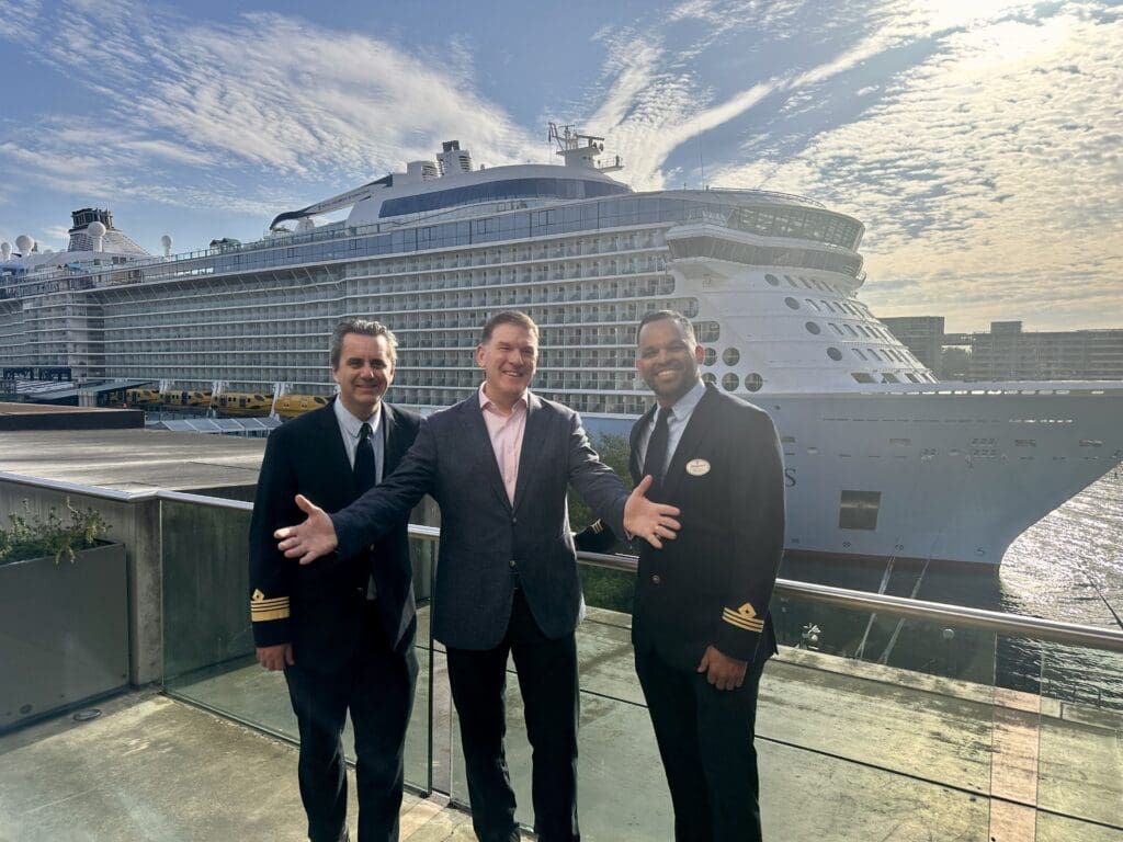 Gavin Smith (centre) with Anthem of the Seas Captain Johan Hill (left) and Chief Officer Deck Abraham Romero Hernandez.