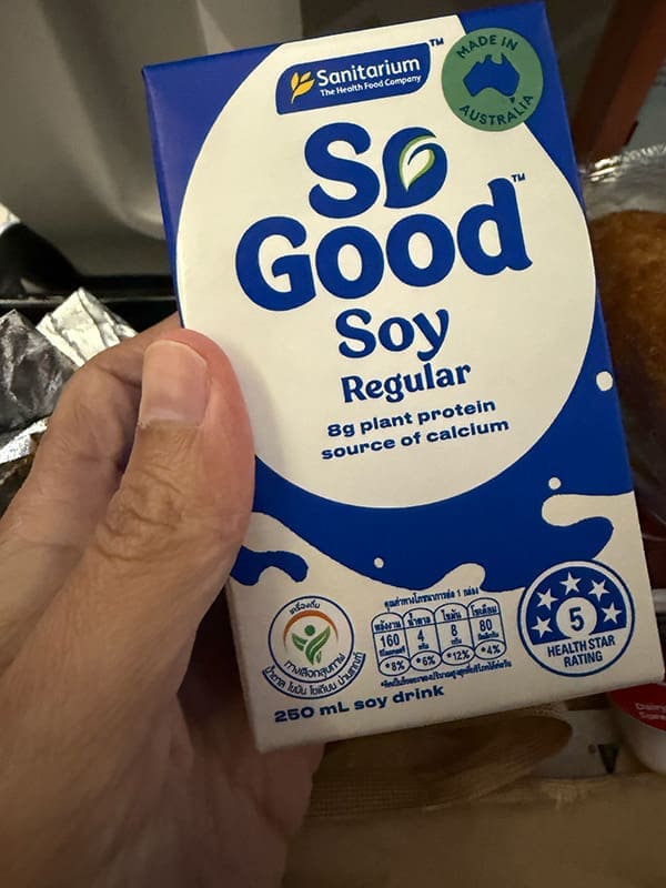 Close-up of So Good soy milk carton.